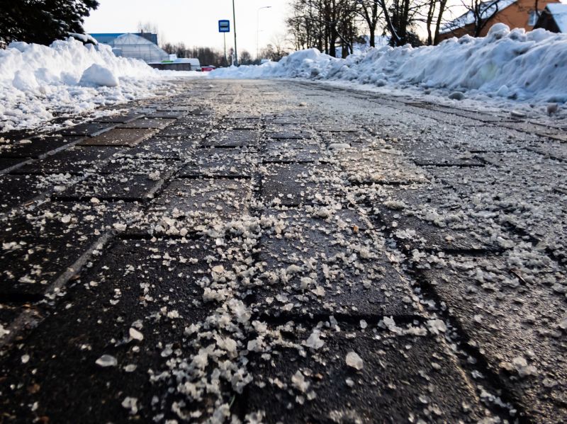 Salting helps prevent snow from compacting into ice